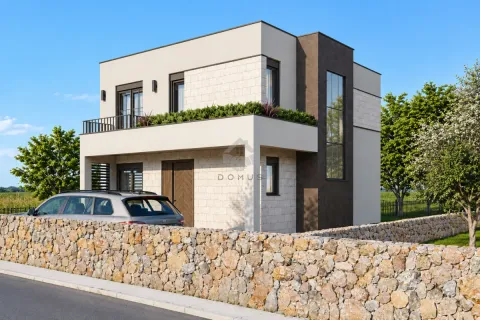 Exterior view of a modern two-story house with a yard and stone fence. - image 2