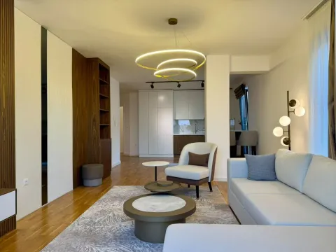 Modern and bright living room with a sofa and dining area in the background. - image 8