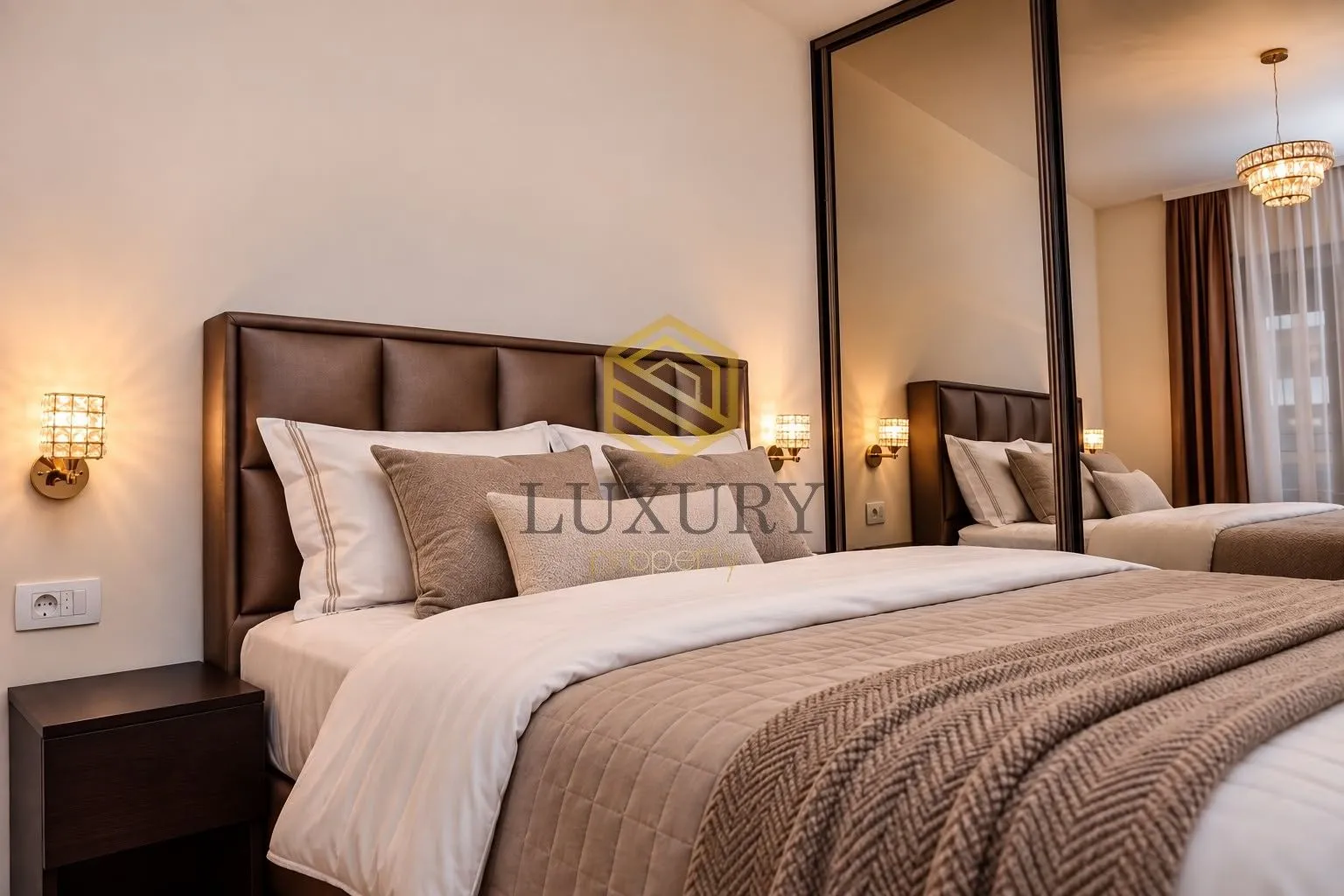 Modern bedroom with a double bed and a large mirror.
