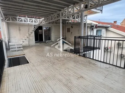 Large covered terrace with a metal structure and staircase. - image 31