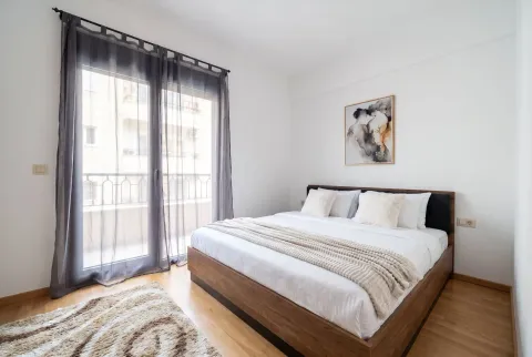 Bright and tidy bedroom with a double bed and access to the terrace. - image 6
