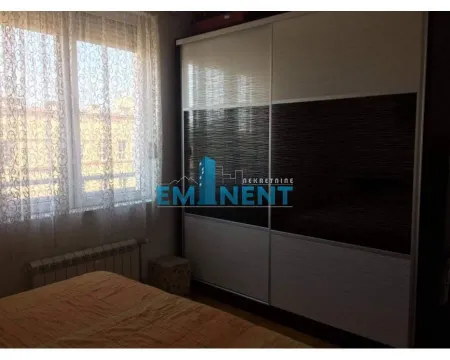 Bedroom with a large wardrobe and a window. - image 8