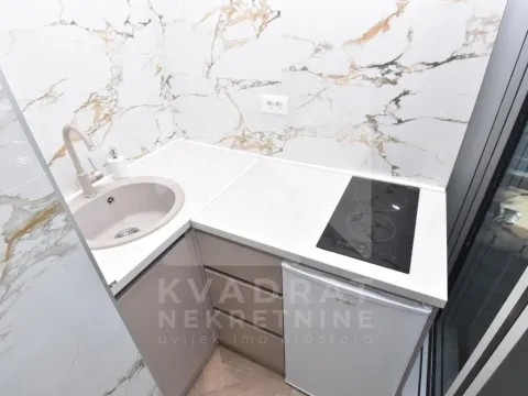 Izdavanje, poslovni prostor, 185m², Centar, Podgorica - image 11