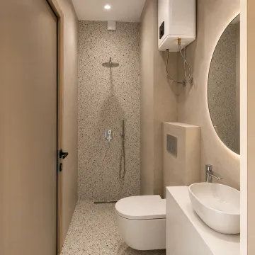 Modernly equipped bathroom with a walk-in shower, toilet and washbasin. - image 13