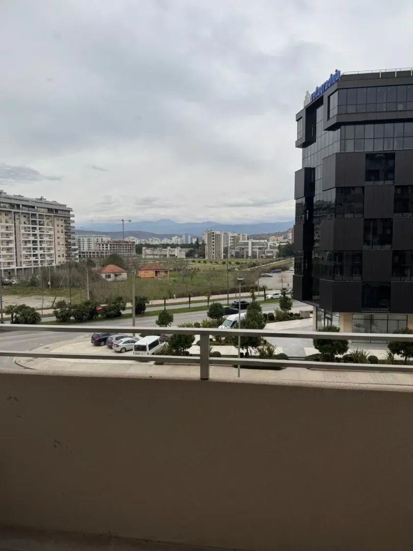 View from the terrace towards the city and surrounding buildings.