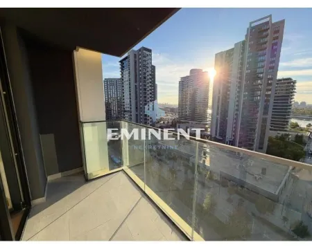 Balcony with a glass railing and city view. - image 3