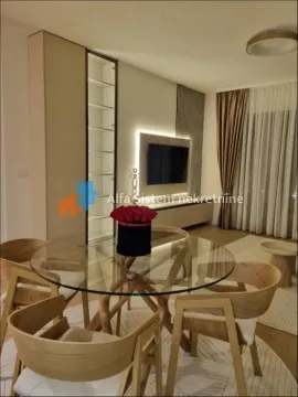 Living room with a dining table and modern furniture. - image 2