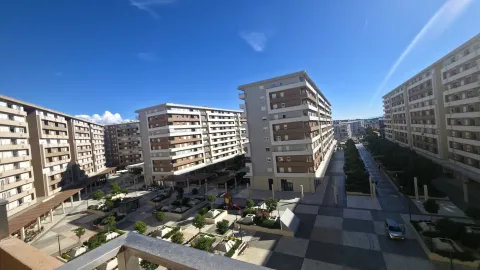 View from the terrace of residential buildings and landscaped courtyard. - image 8