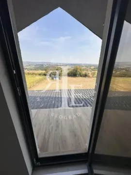 View through a large glass surface onto nature and the surrounding landscape. - image 35