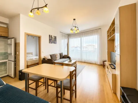 Living room with dining area and view of the terrace. - image 2