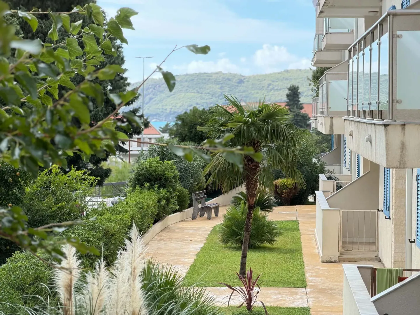 View from the terrace overlooking the landscaped yard and surroundings.