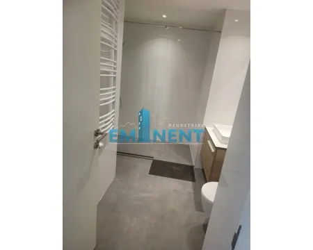 Modern bathroom with a walk-in shower and a washbasin. - image 8