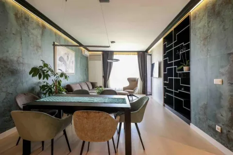 Dnevna soba sa trpezarijom i modernim nameštajem. - image 15