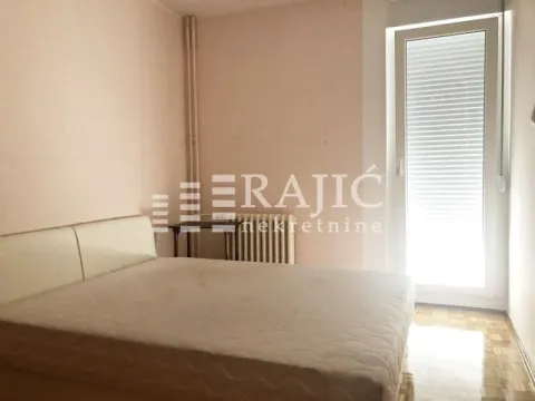 Bedroom with a double bed and access to the terrace. - image 6