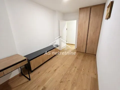 Smaller bedroom with a built-in wardrobe and a chest of drawers. - image 14