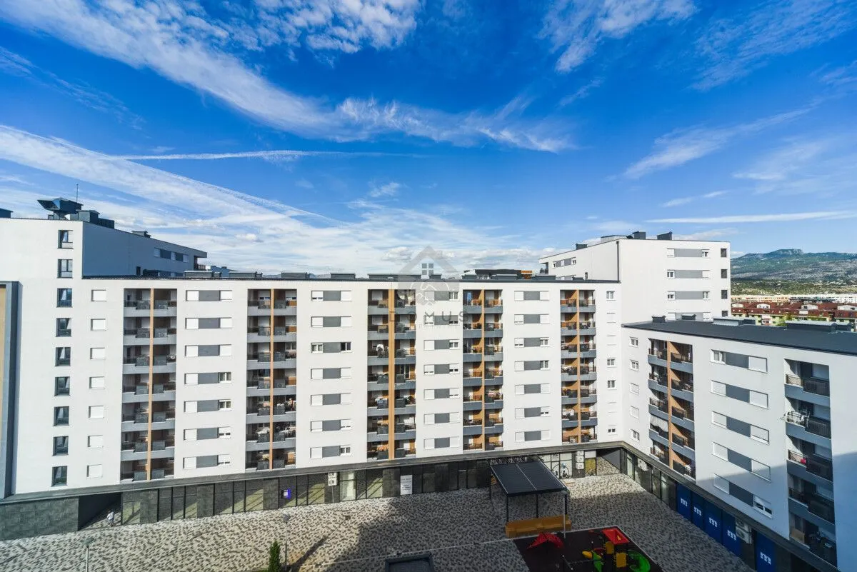 View of the residential building facade and courtyard.