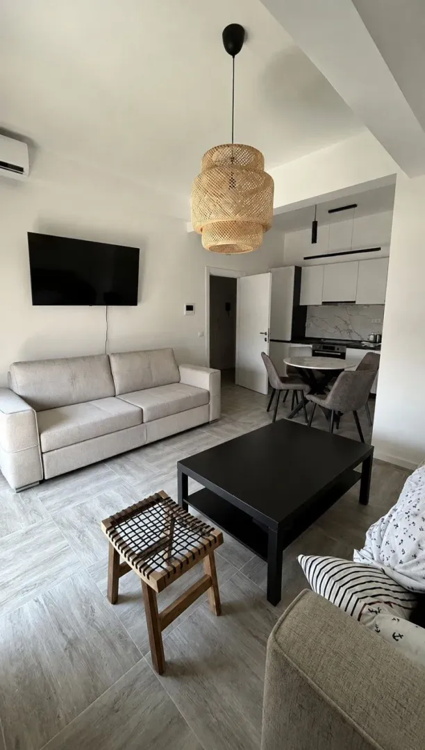 Living room connected to the dining area and kitchen.