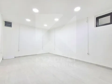 Empty bright room with white walls and recessed lighting. - image 10