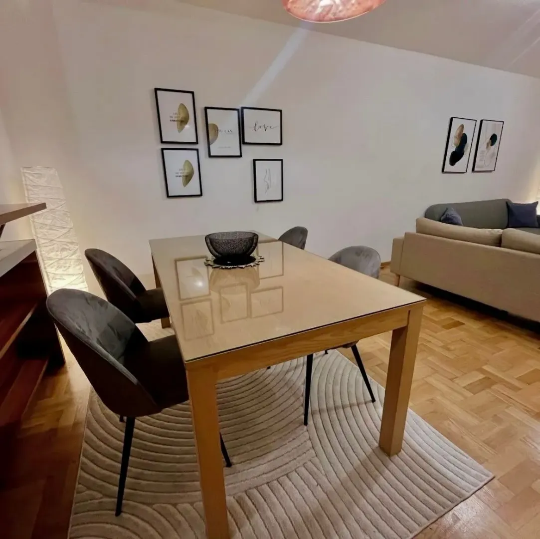 Living room with a dining table and chairs.