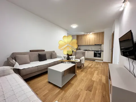 Living room connected with the kitchen in light tones. - image 2