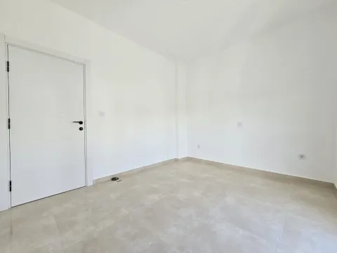 Empty bright room with white walls and ceramic floor tiles. - image 23