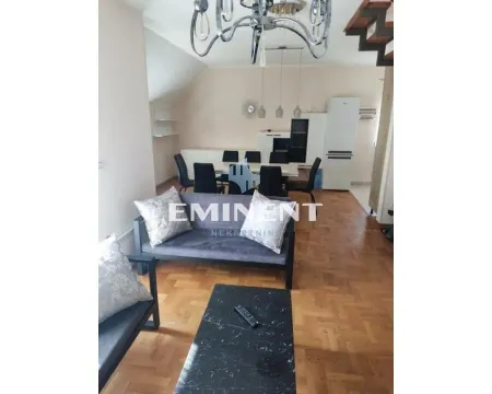 Living room with sofa set and dining area in the background. - image 2