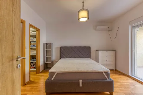 Furnished bedroom with a double bed, air conditioning, and access to the terrace. - image 20