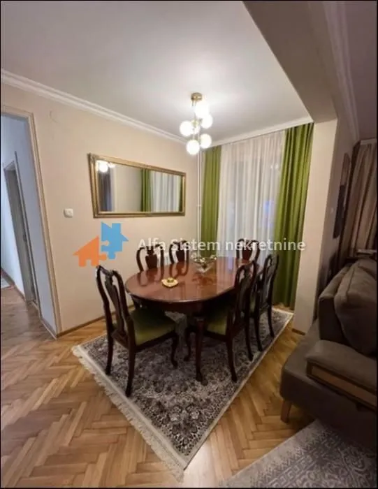 Living room with a dining table and chairs.