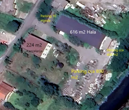 Satellite view of the land with buildings and area labels. - image 5