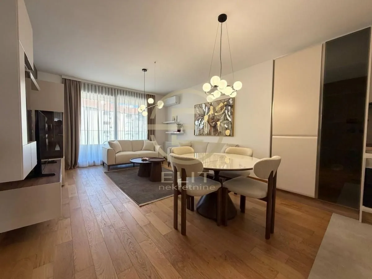 Spacious living room with a dining area and modern furniture.