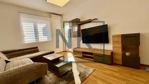 Living room with sofa, TV and access to the terrace. - image 2