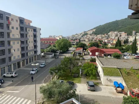 View from the terrace of the city neighborhood and surrounding buildings. - image 3