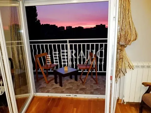View of the terrace and city landscape at dusk. - image 3