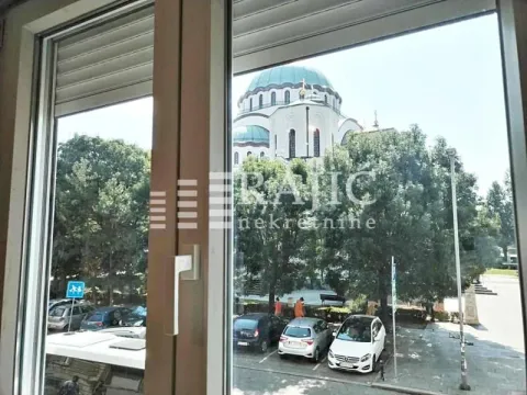 View through the window of a temple and urban surroundings. - image 2