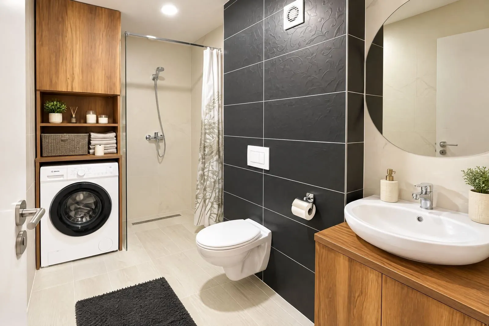 Moderne kupatilo opremljeno umivaonikom, WC šoljom, tuš kabinom i mašinom za veš.