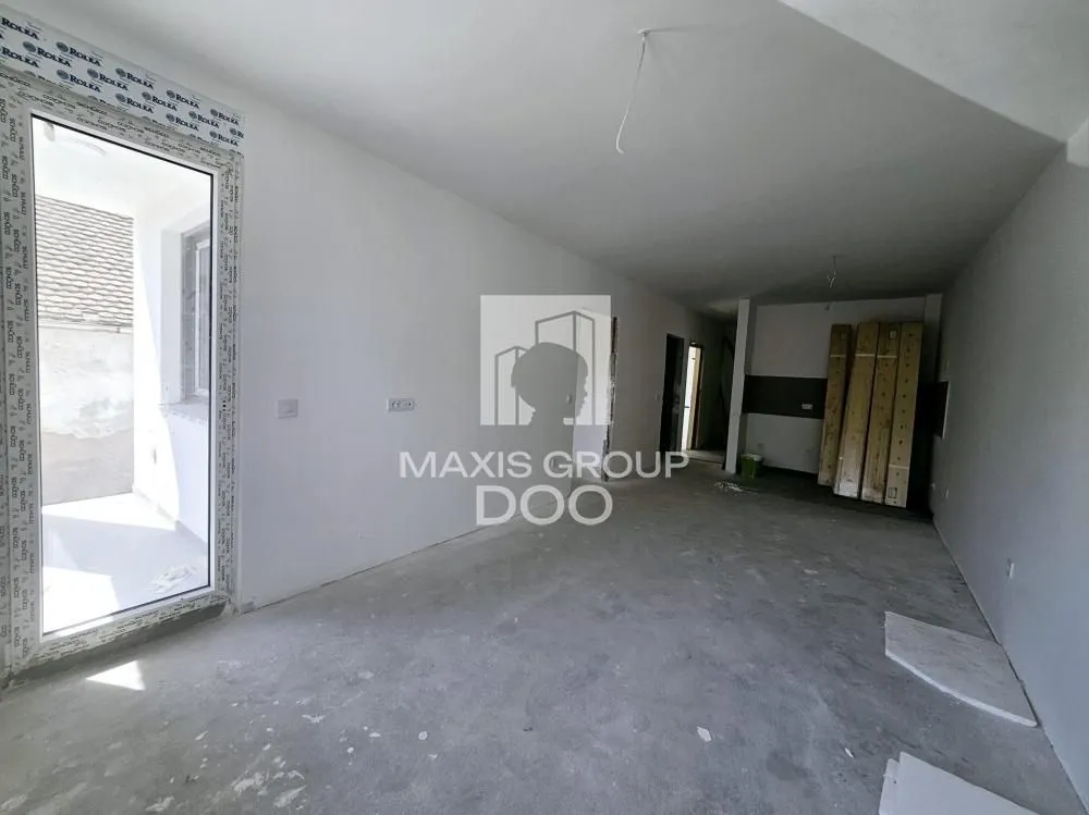 View of an unfurnished room under renovation.
