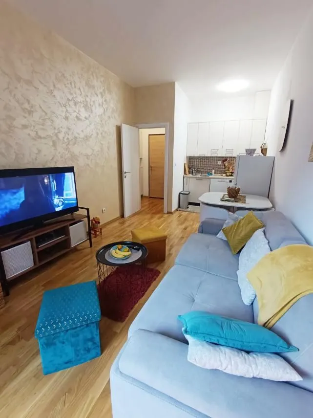 Living room connected to the dining area and kitchen.