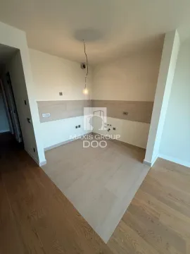 Empty space designated for a kitchen with ceramic tiles and prepared installations. - image 6
