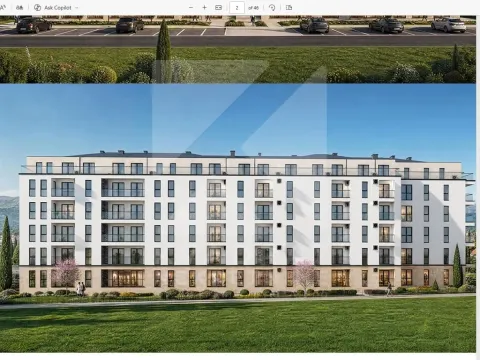 View of the exterior and facade of the residential building with a landscaped yard and parking. - image 2