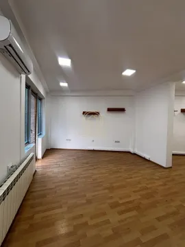 Empty bright room with parquet flooring, air conditioning unit, and a radiator. - image 6