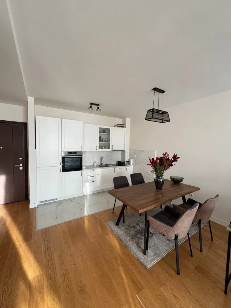 Bright kitchen with a dining table.
