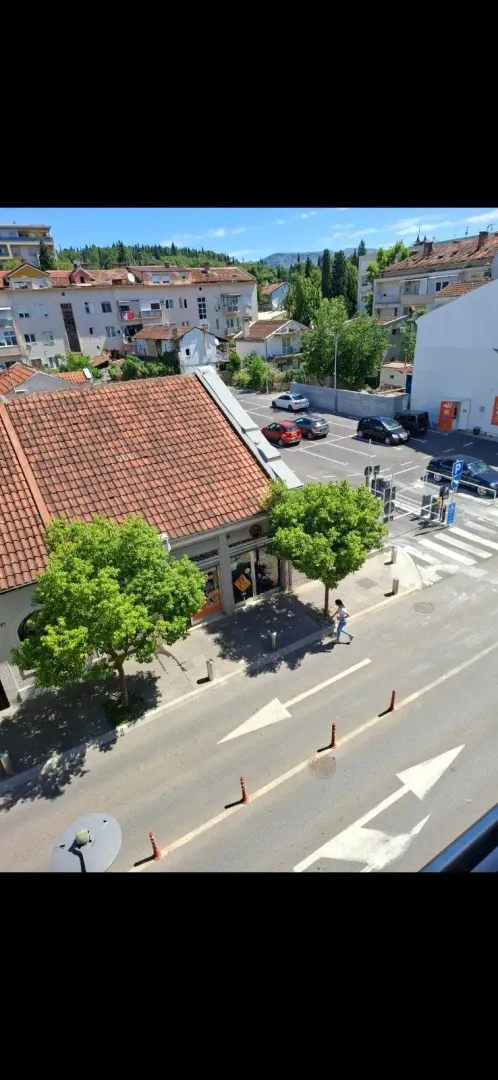 View from the terrace onto the street and urban neighborhood.