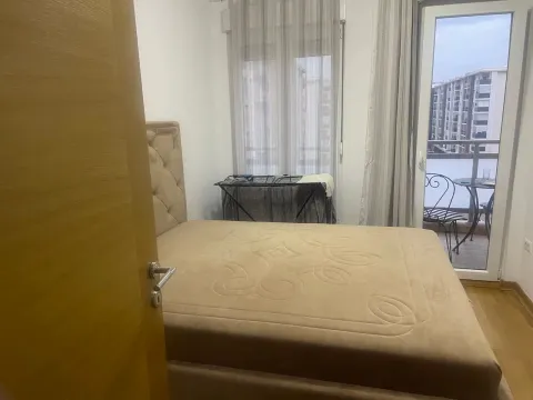 Bedroom with a double bed and access to the terrace. - image 8