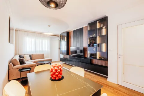 Modern living room with a sofa set and a dining table. - image 5