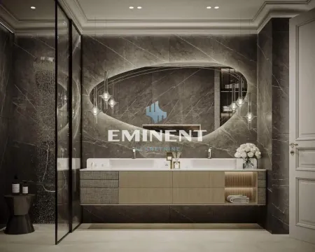 Modern bathroom with a double vanity, large illuminated mirror, and a walk-in shower. - image 15