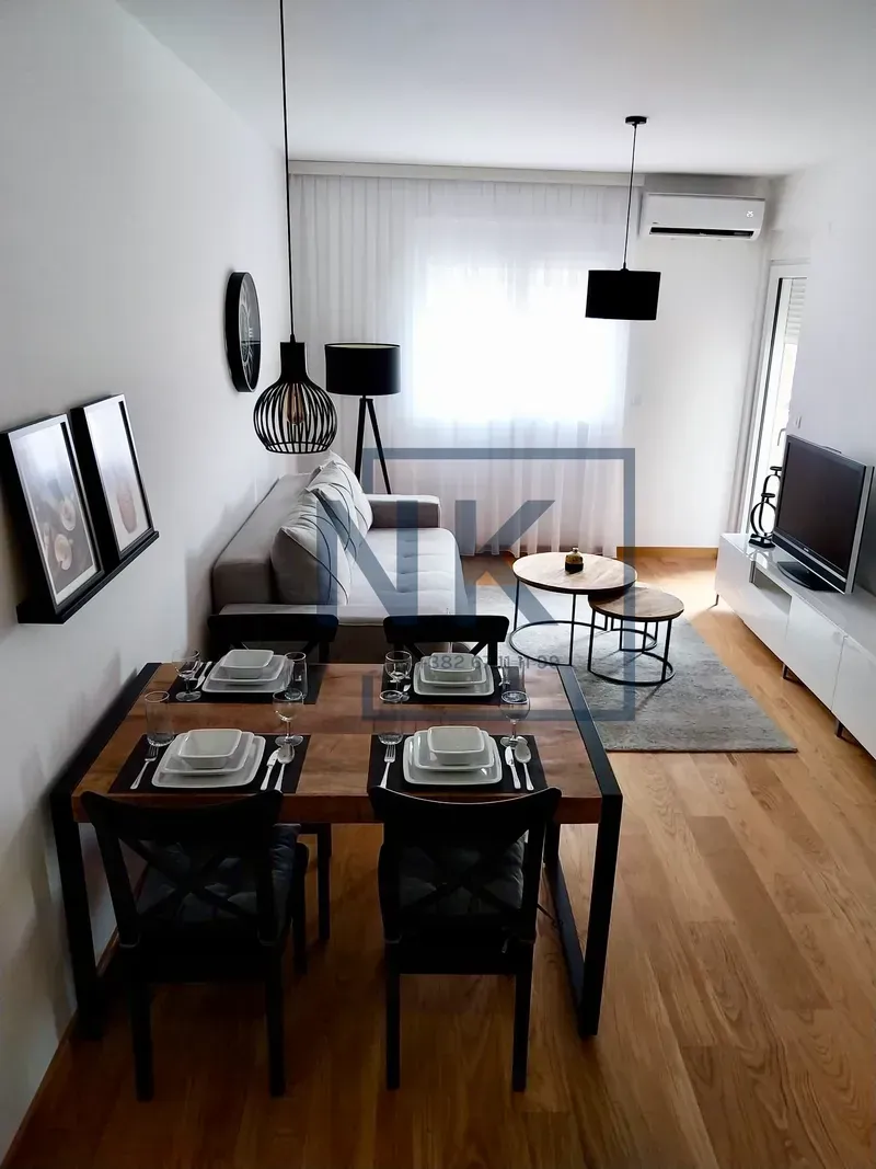 Living room with a dining area and seating set.
