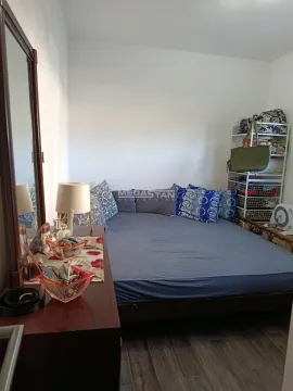 View of the bedroom with a double bed and a dresser with a mirror. - image 5