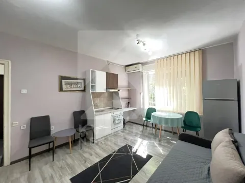 Living room with kitchen and dining area. - image 2