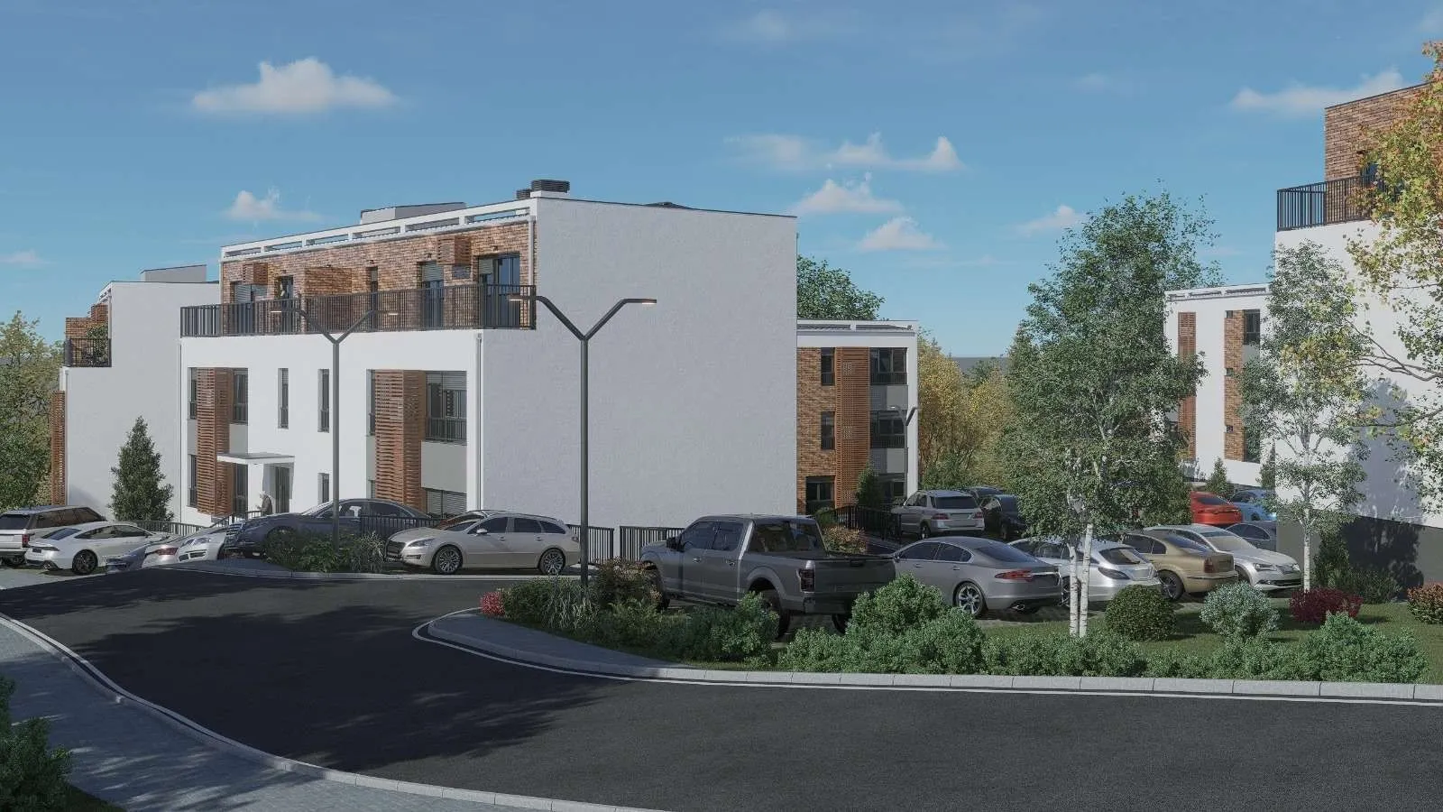 Prikaz eksterijera zgrade sa uređenim parking prostorom i zelenilom.