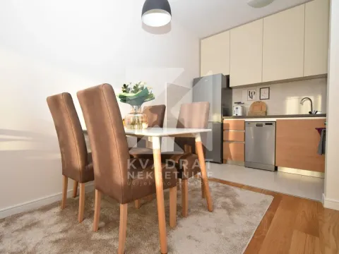 Kitchen with dining area and modern furniture. - image 8